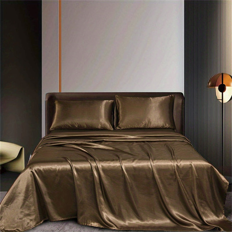 4pcs Satin Bed Sheet Four-Piece Set Includes One Fitted Sheet, One Flat Sheet, And Two Pillowcases. Pillowcases Do Not Include Inserts. Solid Colors Showcase Simple Elegance. The Simple Style Is Classic And Timeless. Polyeste